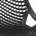 Detail | close view of black molded-plastic diamond lattice, lattice seat and side opening