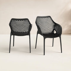 Room | The Wulfern Viokastro Mesh Stacking Dining Armchairs, Set of 2 in a styled room