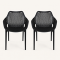 Studio front | two matte-black open-mesh armchairs, front view, on a warm-white studio ground