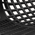 Mesh close-up | matte-black open diamond lattice at the seat and back