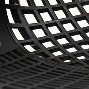 Mesh close-up | matte-black open diamond lattice at the seat and back