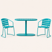 Front | straight-on studio view of the teal oval table and two matching folding armchairs