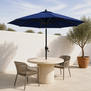 Angle | low three-quarter view beneath navy umbrella canopy showing black ribs over terrace table