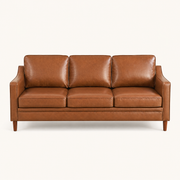 Front | Chestnut faux-leather three-seat sofa straight on in a clean warm-white studio