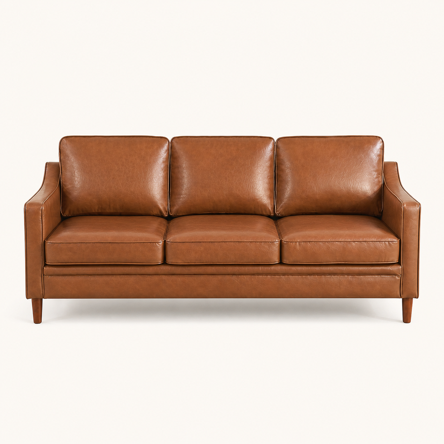 Front | Chestnut faux-leather three-seat sofa straight on in a clean warm-white studio