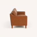 Side profile | Left-side studio view showing the square arm, back profile, and tapered brown wood legs